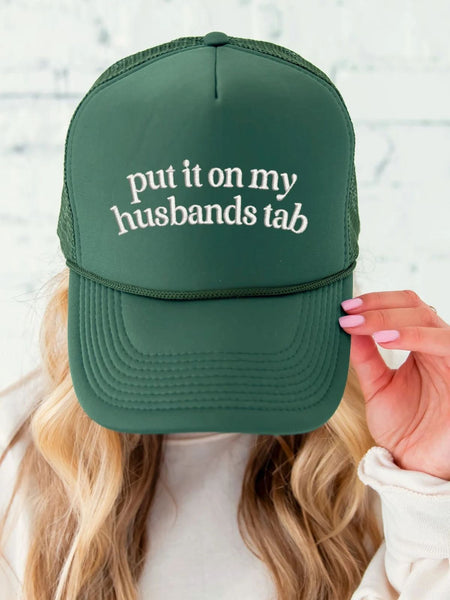 Put It On My Husbands Tab Trucker Hat